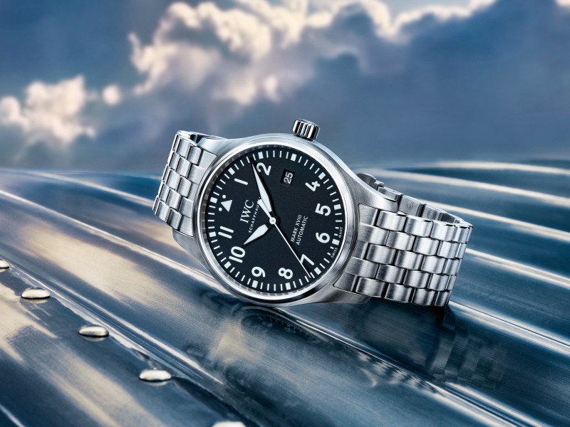 HANDOUT  The Pilots Watch Mark XVIII (Ref. IW327011) from IWC Schaffhausen features a case in stainless-steel, black dial and stainless-steel bracelet with a fine-adjustment clasp. Engraved into the reverse side of the watch is a depiction of a Ju 52. (PHOTOPRESS/IWC)